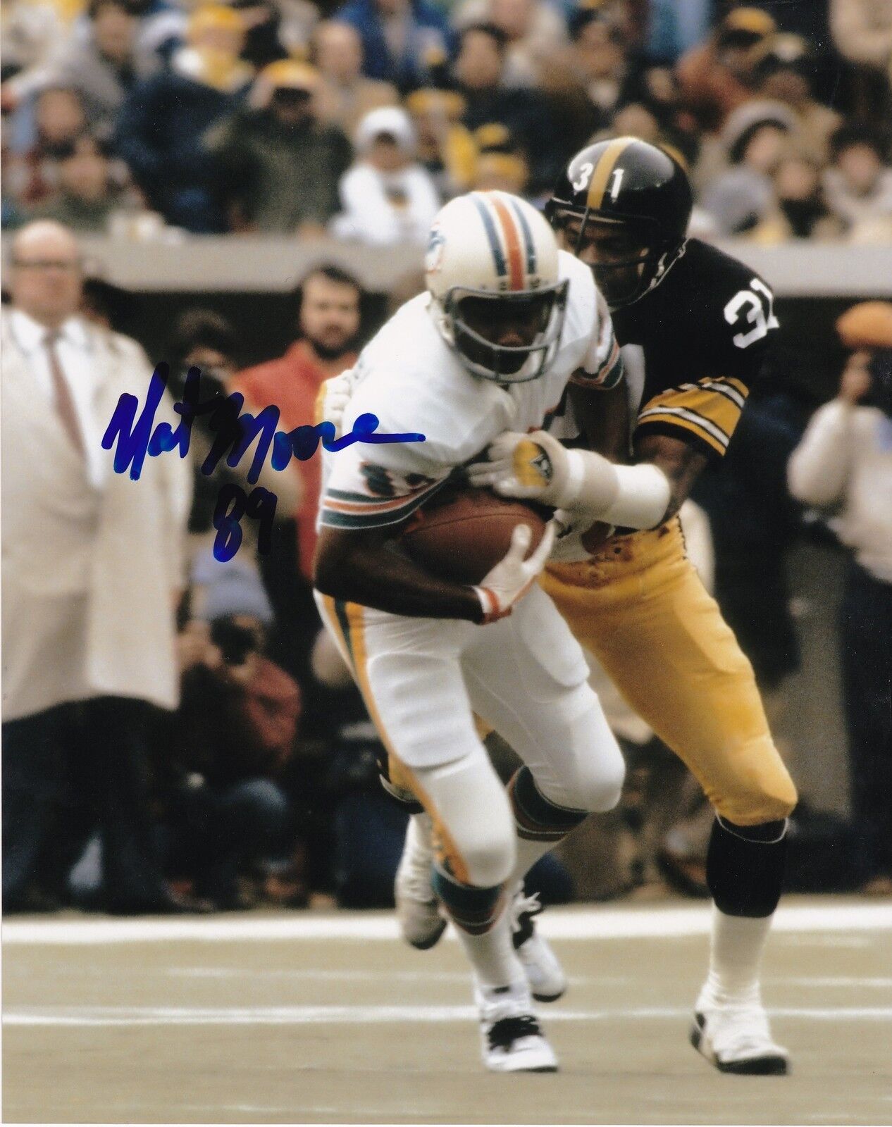 NAT MOORE MIAMI DOLPHINS ACTION SIGNED 8x10