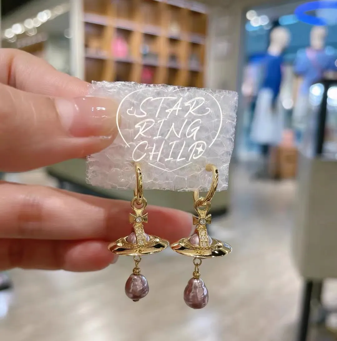 Vivienne Westwood Light Purple Baroque Pearl Earrings
