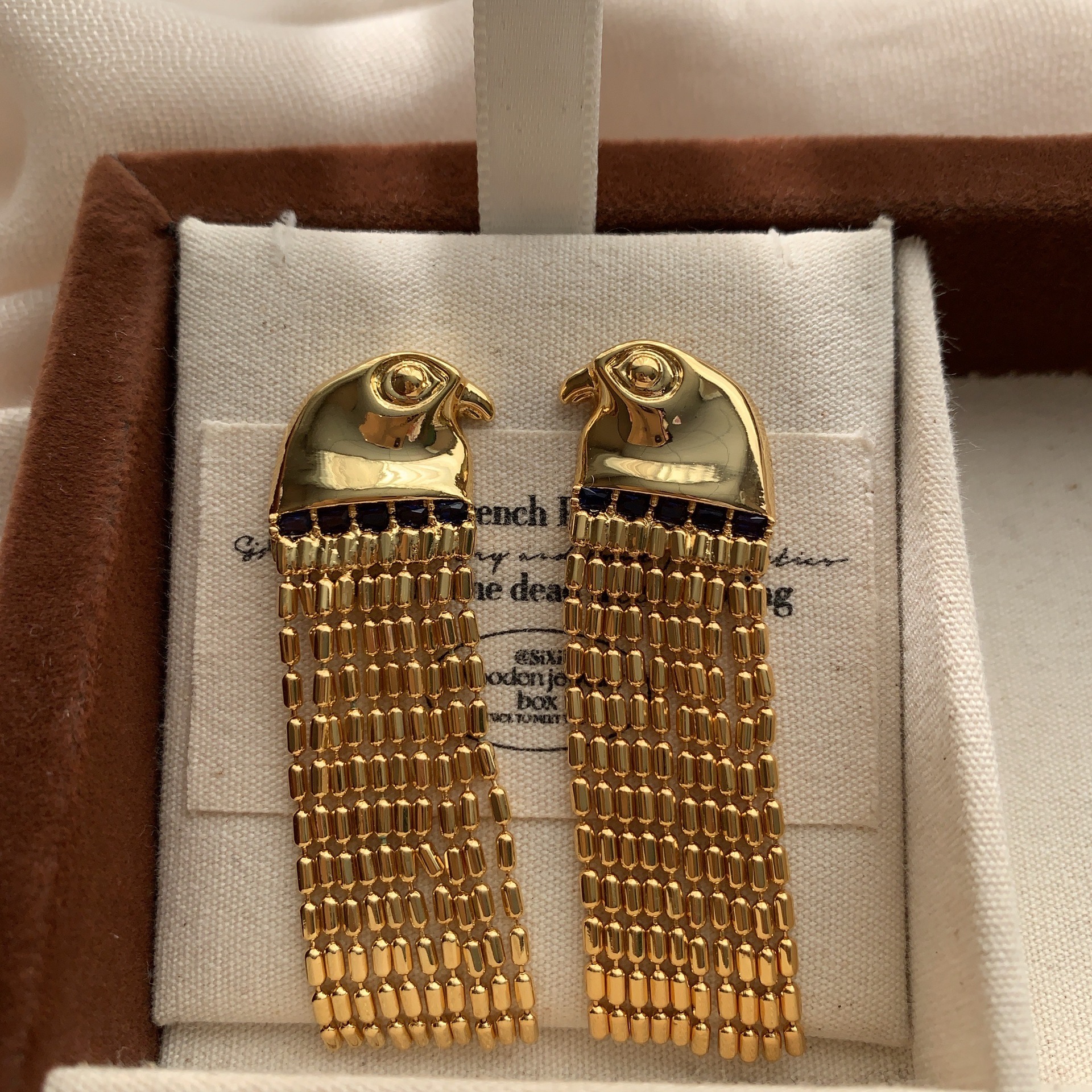 Gold 3D eagle head earrings with tassel chain luxurious retro style glamorous aura unique earrings