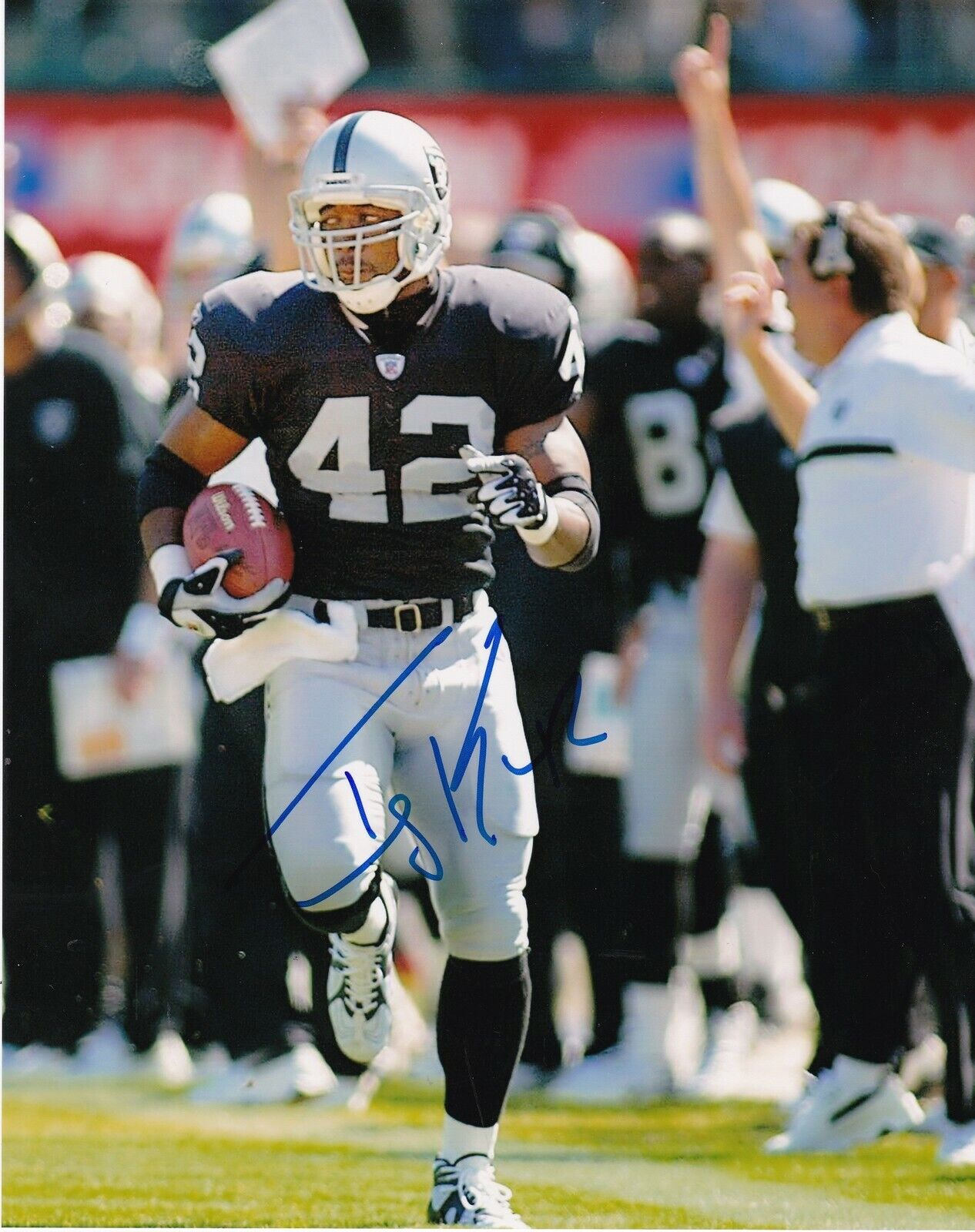 TERRY KIRBY OAKLAND RAIDERS ACTION SIGNED 8x10