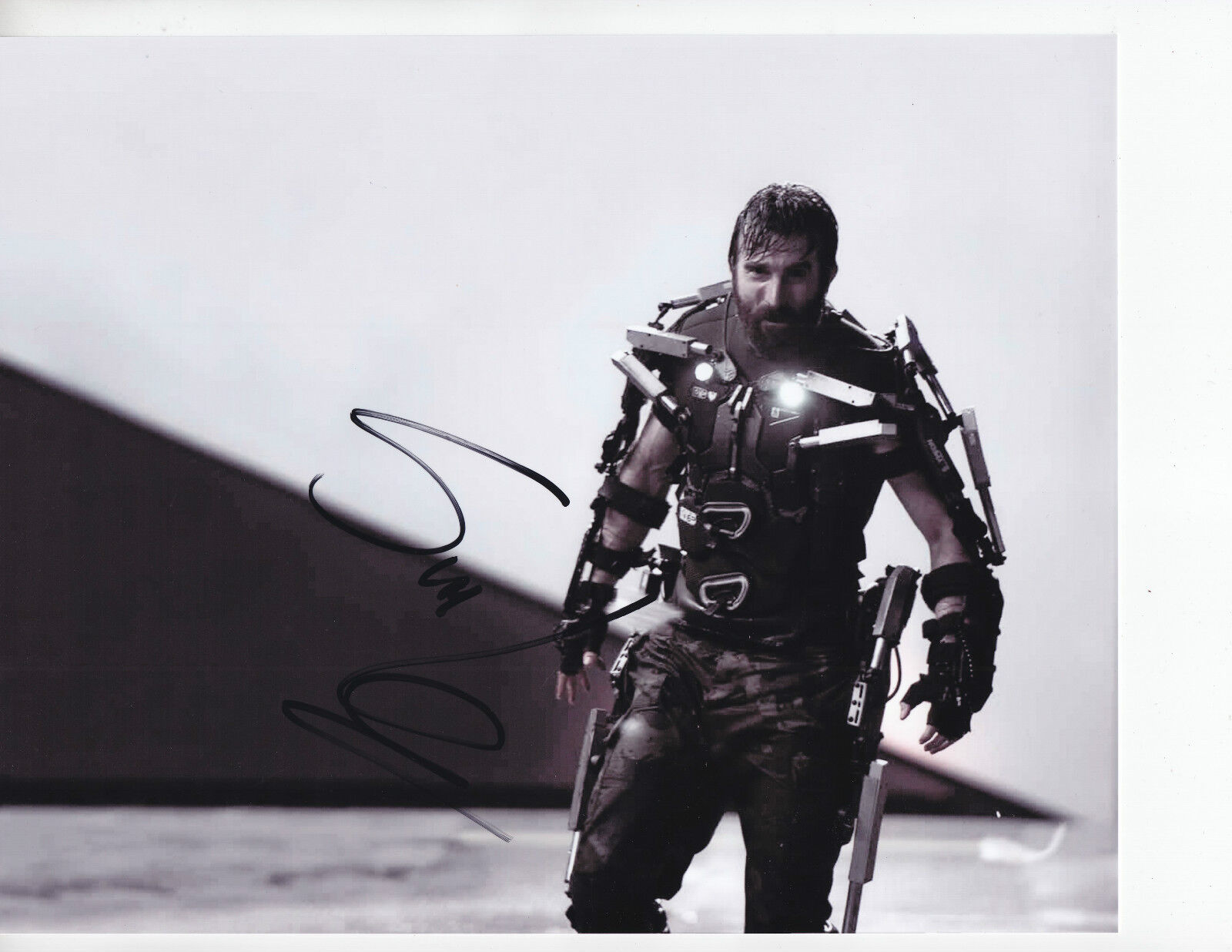 Sharlto Copley - ELYSIUM - signed 8x10