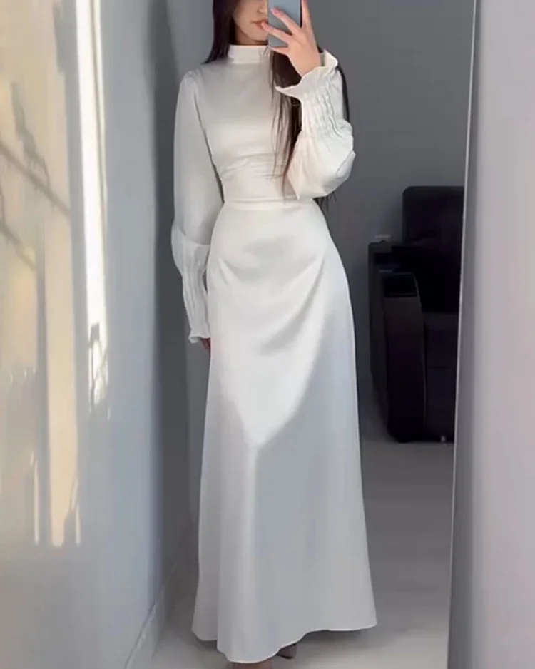 Elegant waisted pleated cuff dress