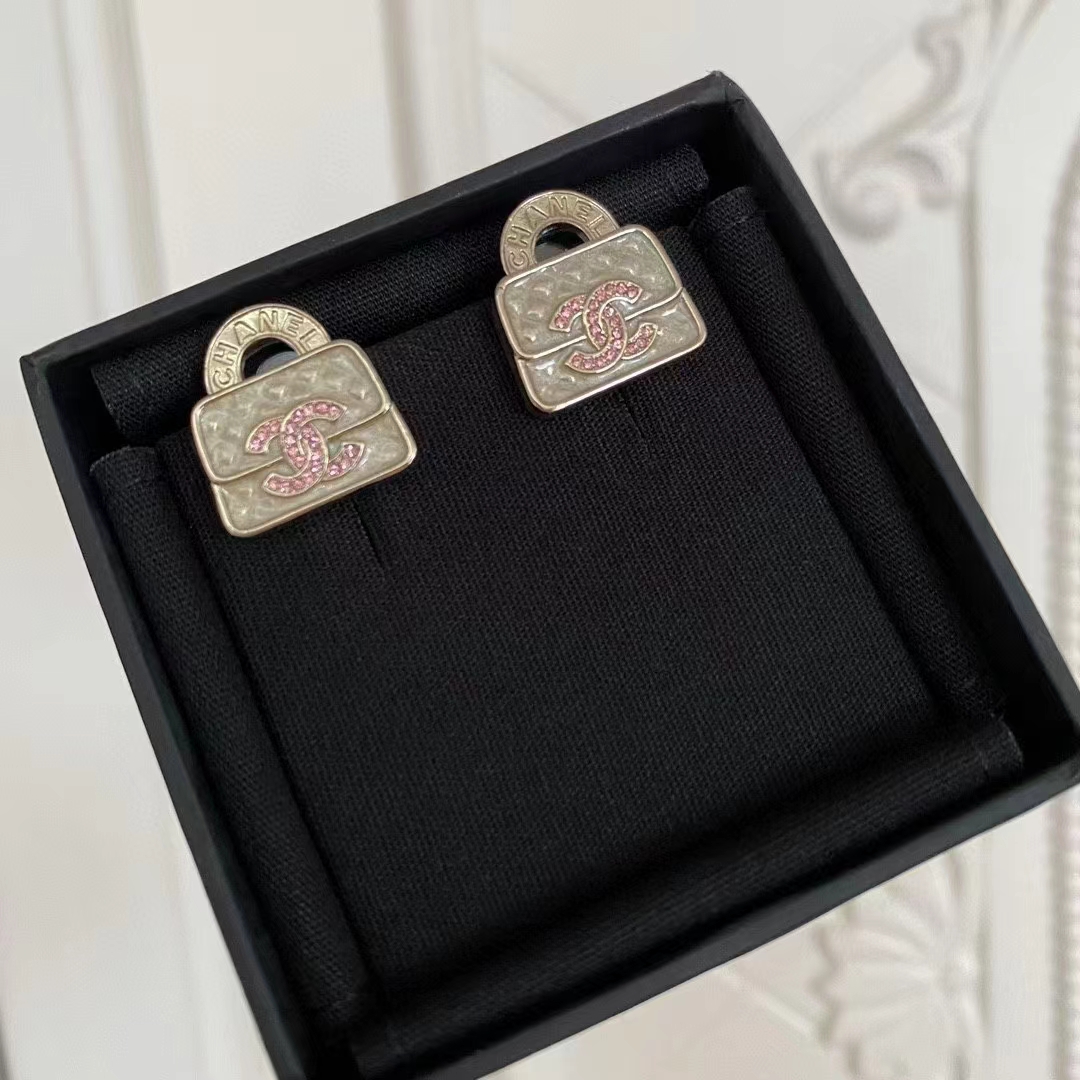 Buy replica Chanel Pink Double C Lock Earrings and replica jewelry from PICKS Jewelry
