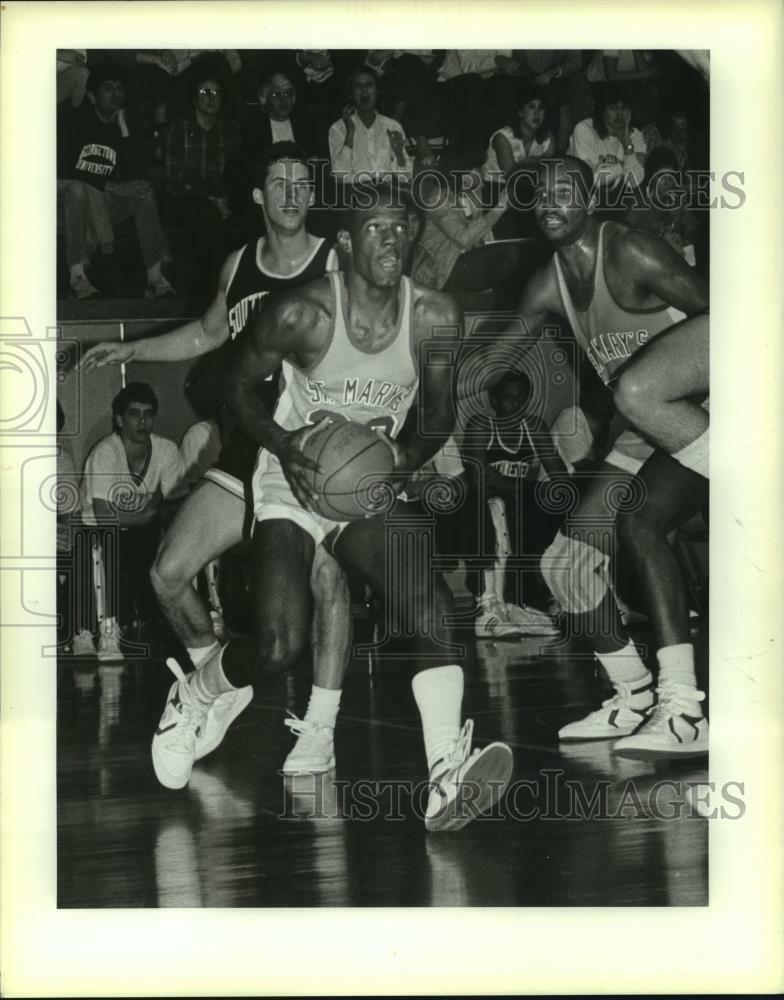 Press Photo Poster painting Ervin Monier drives the baseline against Southwest, Basketball