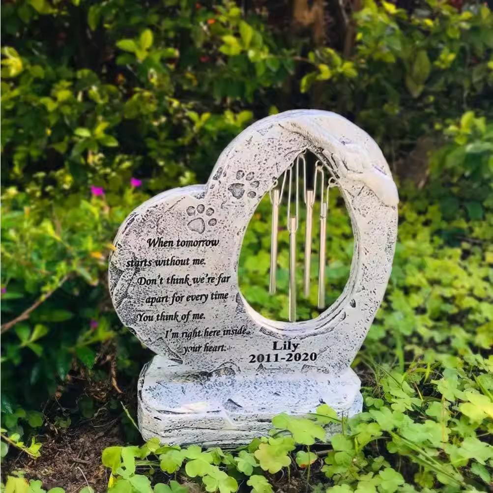 Honor the memory of your beloved companion with our Heart-Shaped Custom Pet Memorial Wind Chime. Crafted from durable resin, this personalized garden decor features a classic heart design that brings a soothing melody to your outdoor space. Personalize it with your pet&lsquo;s name and a special message to create a unique keepsake. Perfect as a dog memorial gift or cat memorial gift, it serves as a comforting tribute for those missing a faithful friend. Whether placed in a garden or by a favorite resting spot, this custom wind chime is a beautiful way to remember the love you shared.