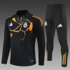 Real Madrid 25-26 1/4 Zip Tracksuit Black & Orange Camouflage Style Chandal