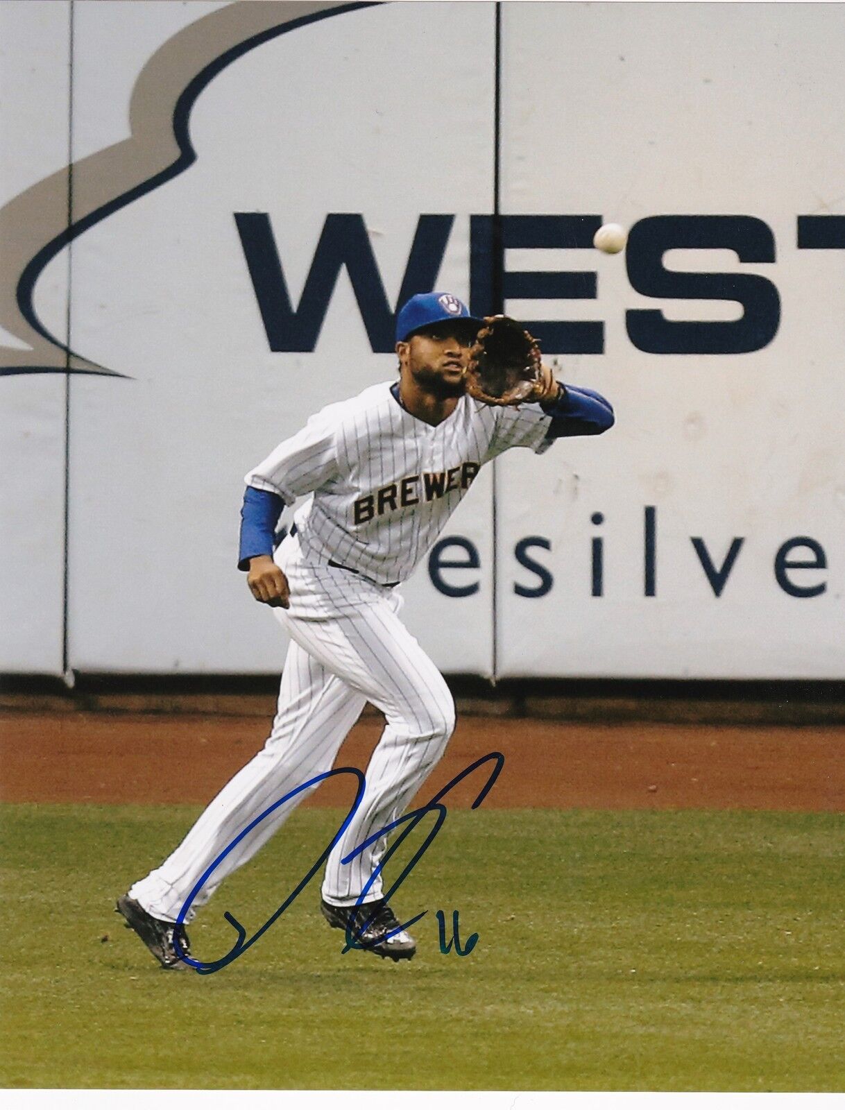 DOMINGO SANTANA MILWAUKEE BREWERS ACTION SIGNED 8x10