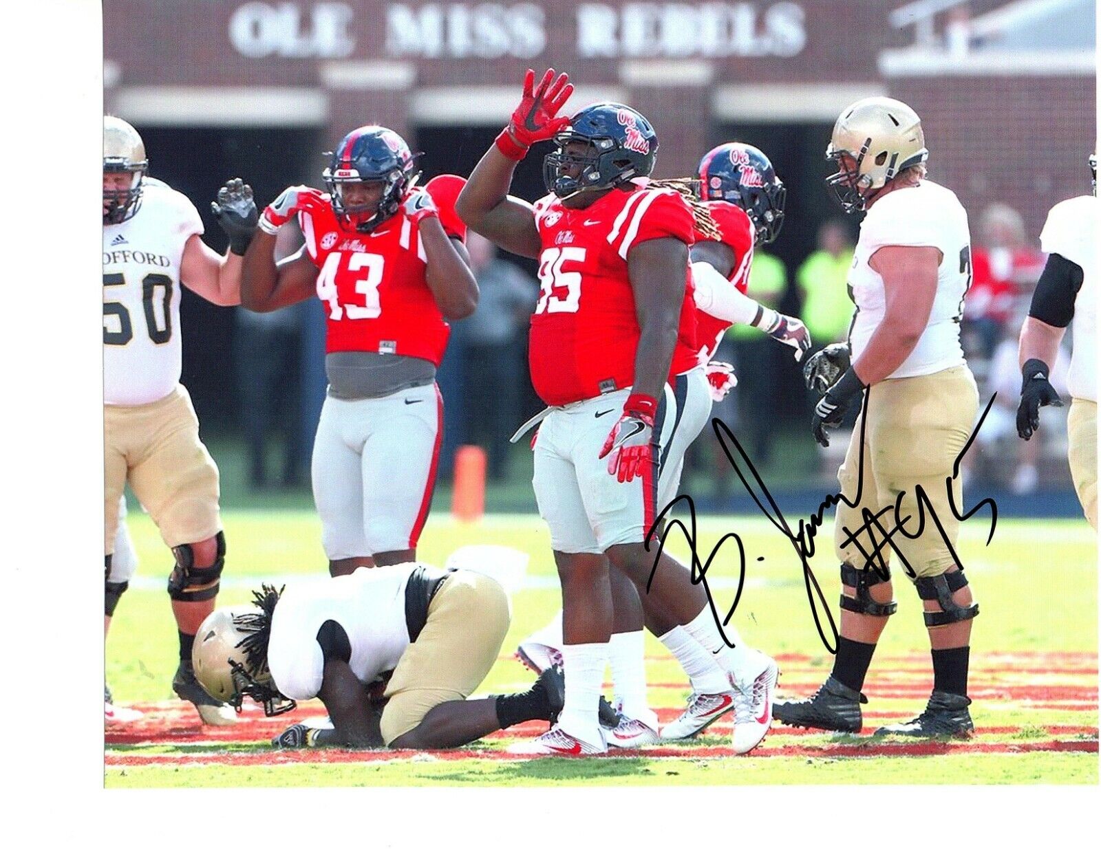 Benito Jones Ole Miss Rebels signed autographed 8x10 football Photo Poster painting Mississippi