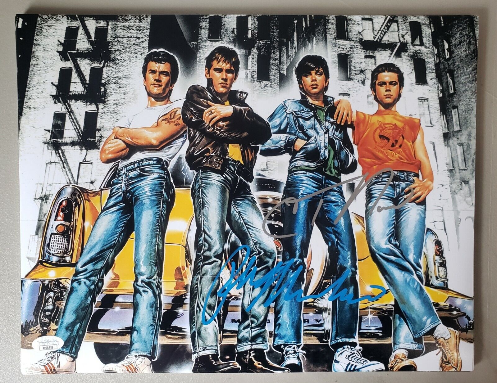 11x14 Autographed by C Thomas Howell and Ralph Macchio in The Outsiders. JSA