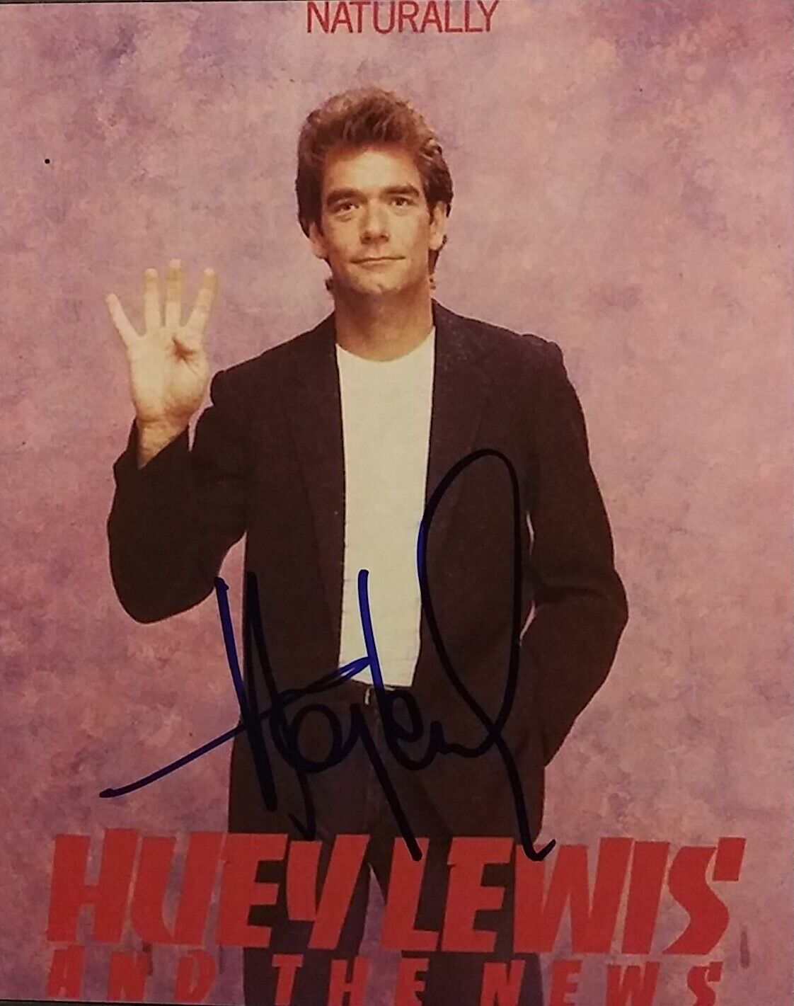 Huey Lewis signed 8x10