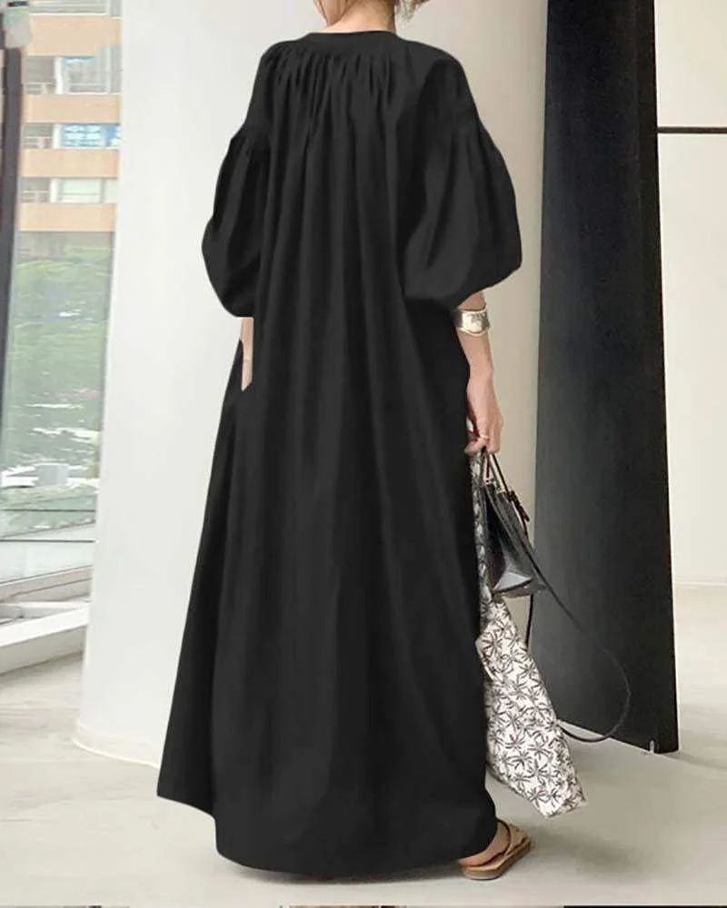 Loose dress with balloon sleeves