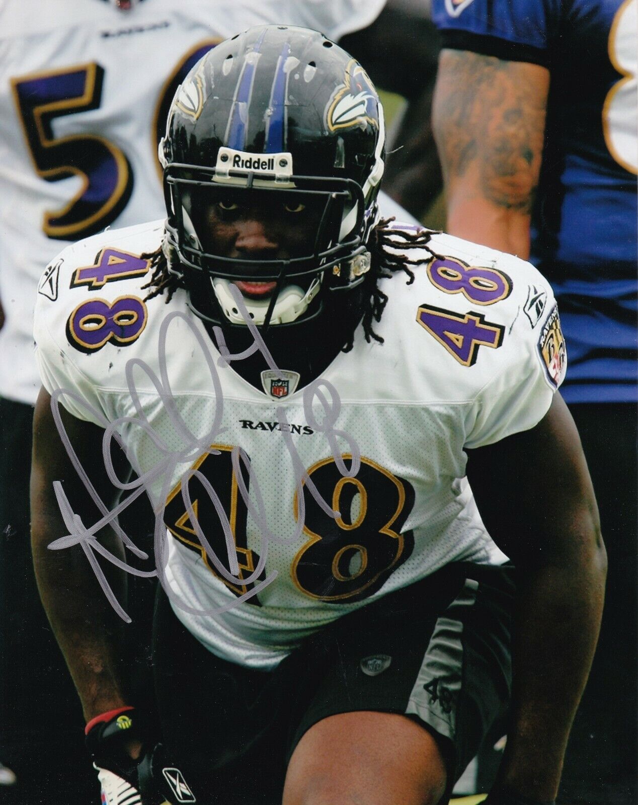 DANNELL ELLERBE BALTIMORE RAVENS ACTION SIGNED 8X10