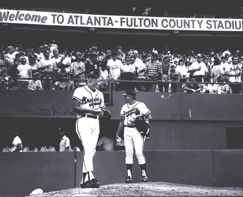 Phil Niekro authentic signed baseball 11X14 Photo Poster painting W/Cert Autographed A0025