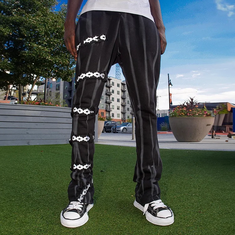 Fashionable casual strappy printed striped trousers
