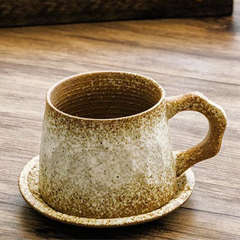Non-Uniform Shape Stoneware Teacups Peppered with Spoon