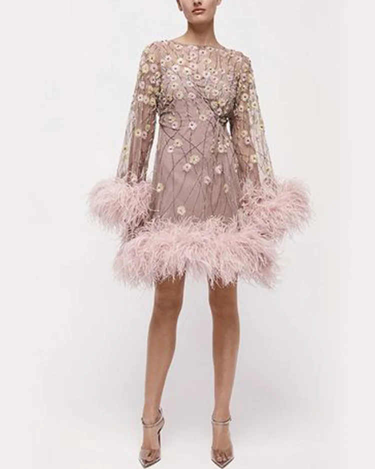 Elegant embroidered feather dress