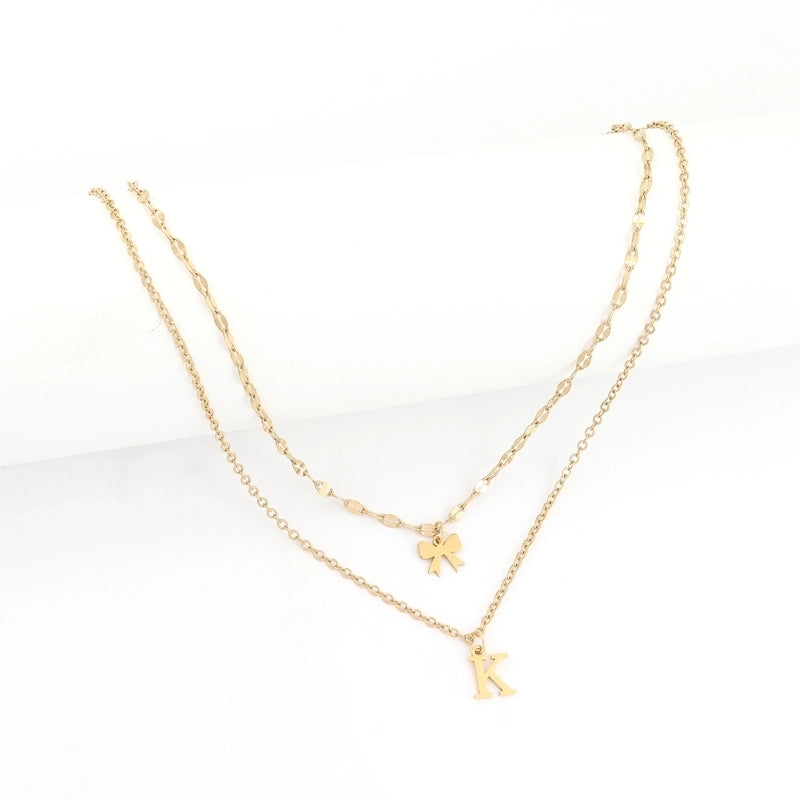 Elegant Minimalist Classic Style Letter Bow Knot 201 Stainless Steel 304 Stainless Steel Pendant Necklace