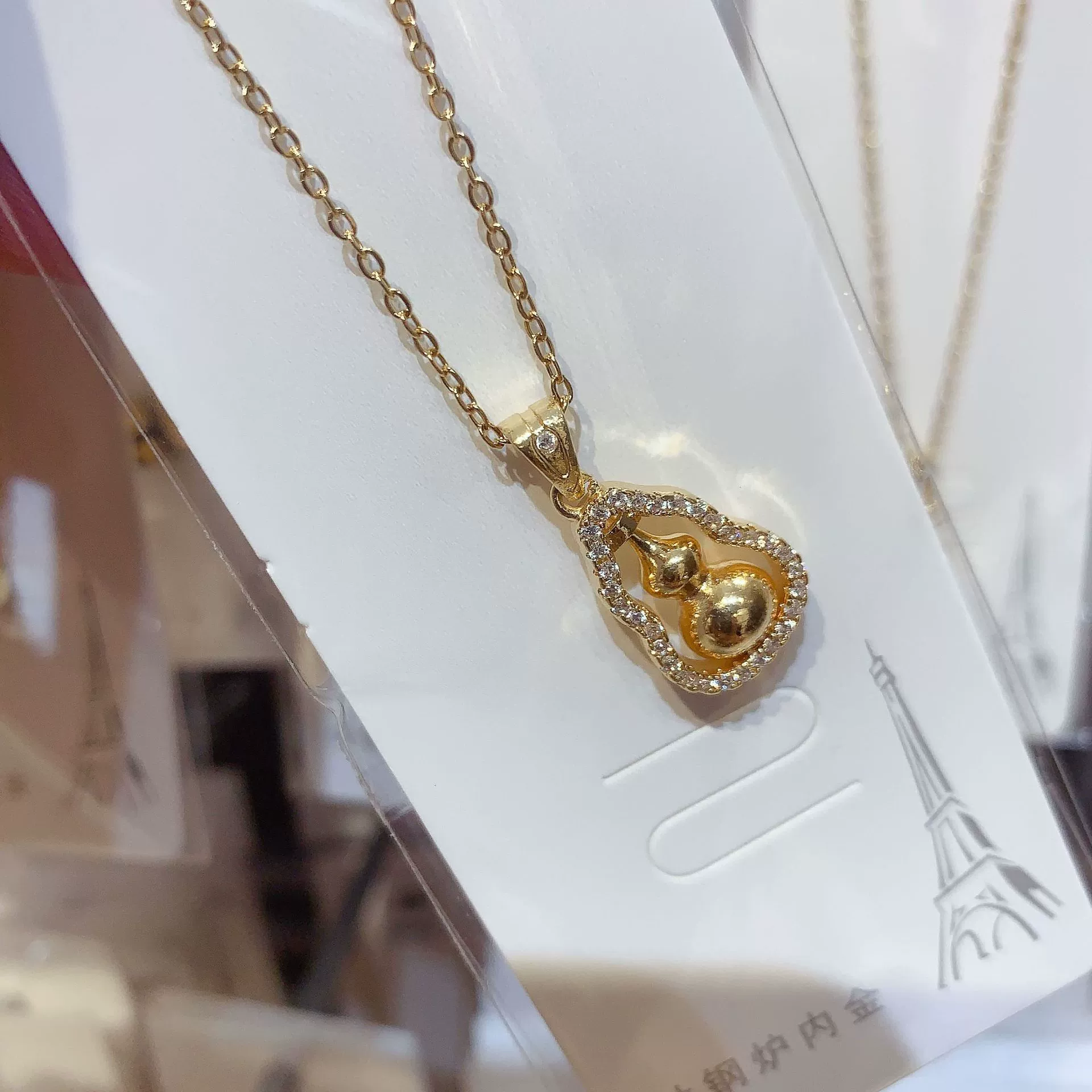 Titanium steel gourd necklace (gourd can be rotated)