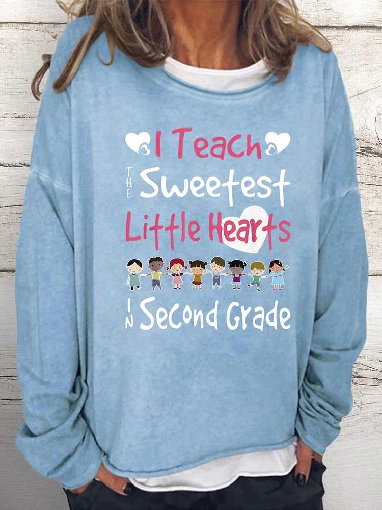 I teach the sweetest little hearts Women Loose Sweatshirt