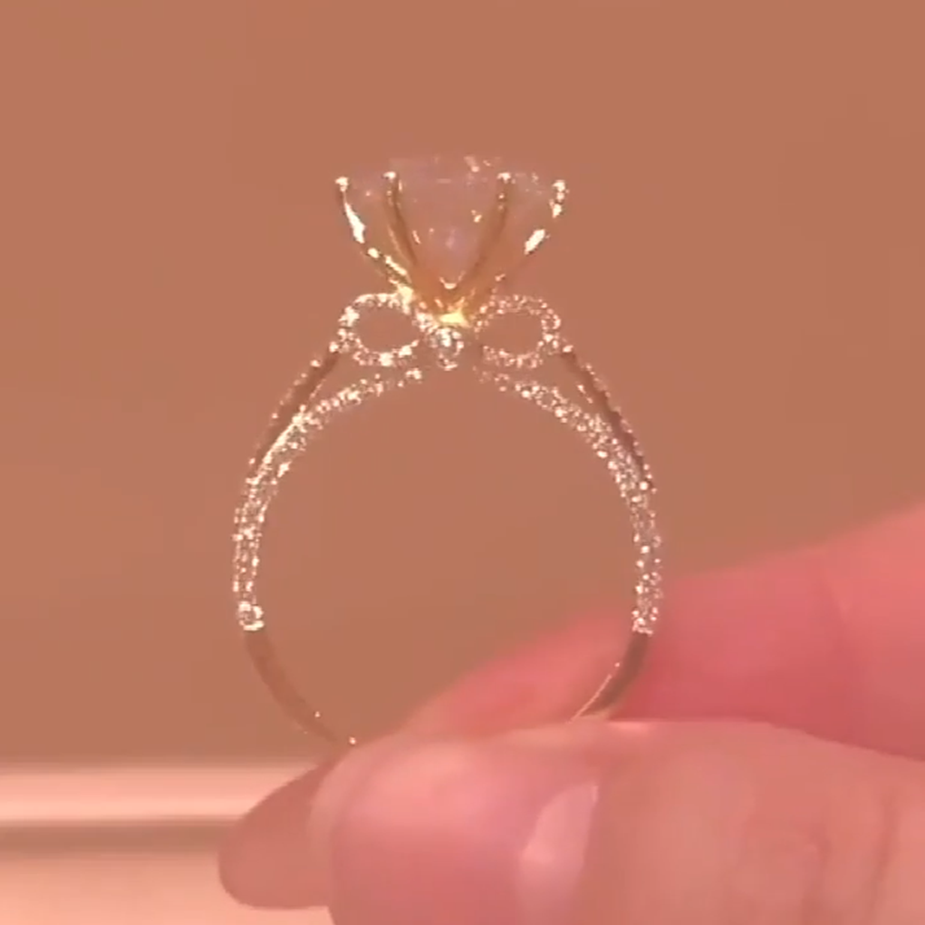 Solitaire Moissanite Ring with Accents and Bow Detail