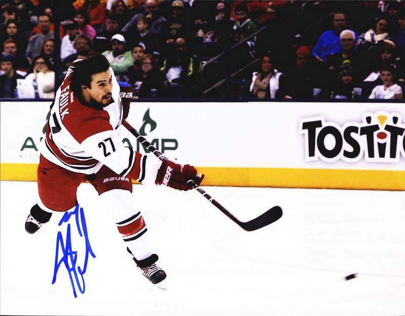 Justin Faulk authentic signed NHL hockey 8x10 Photo Poster painting W/Cert Autographed A0001