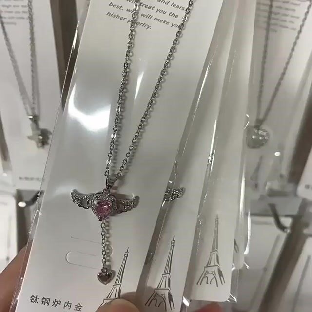 Wings, love, zircon, necklace (wings move by pulling on the tail chain).