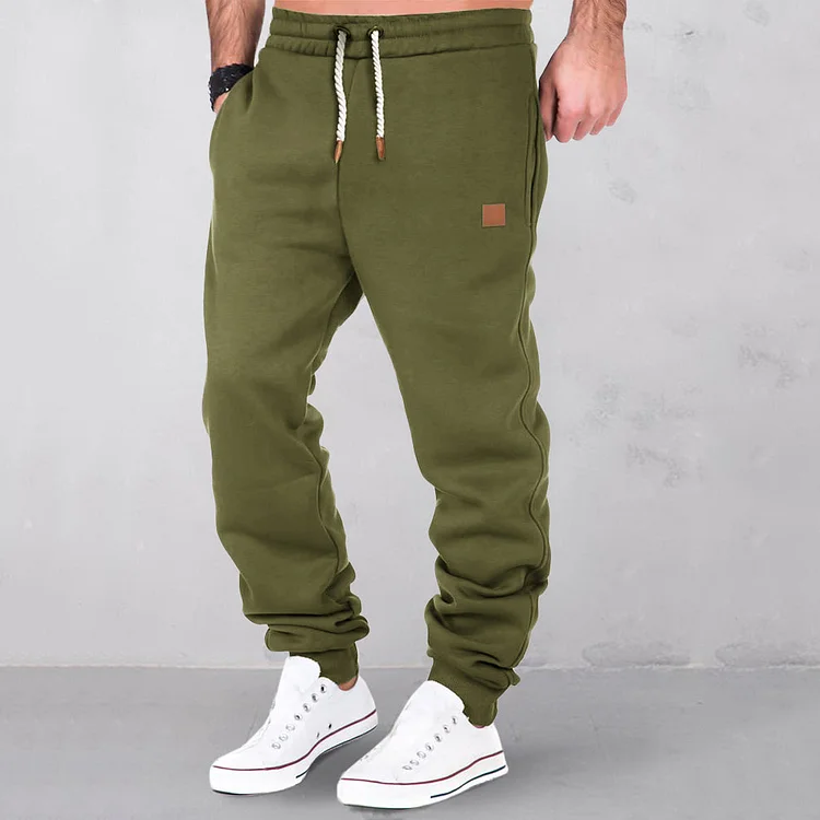 Men's Sporty Solid Color Drawstring Pocket Tapered Pants