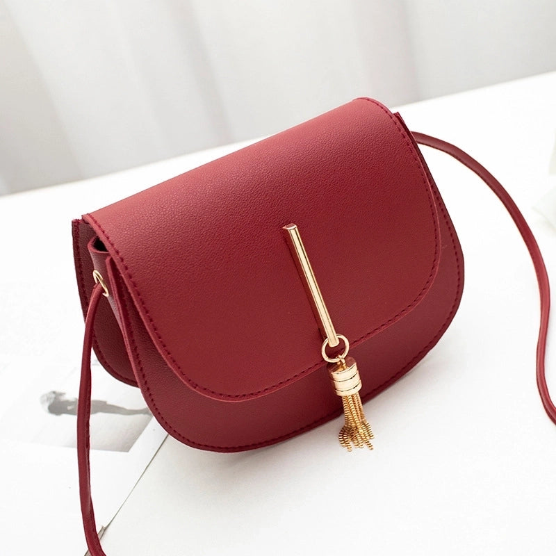 Women’s Small Pu Leather Solid Color Elegant Tassel Oval Magnetic Buckle Crossbody Bag