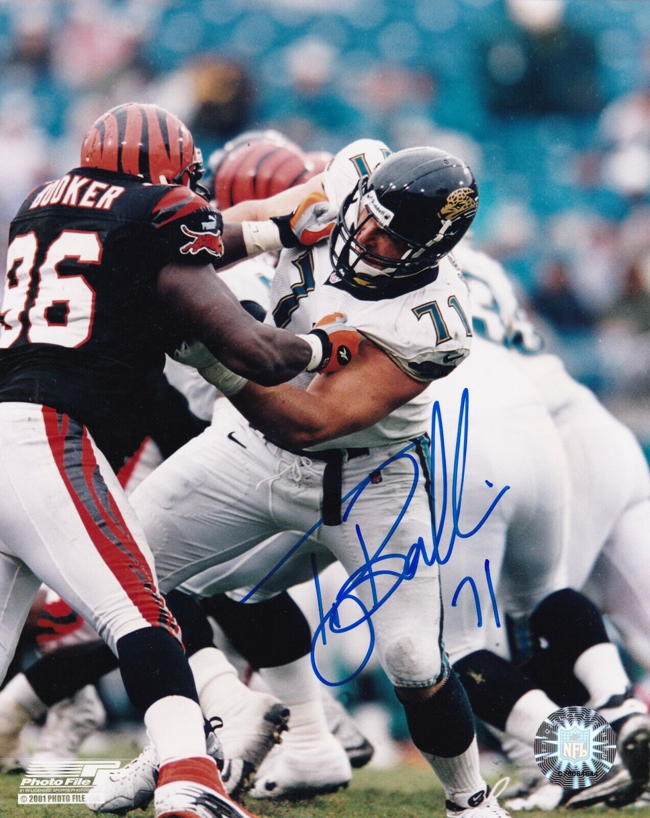 TONY BOSELLI JACKSONVILLE JAGUARS ACTION SIGNED 8x10