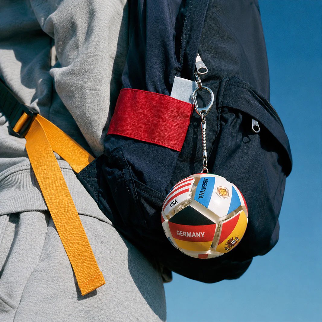 Football keychain on backpack Football keychain on backpack