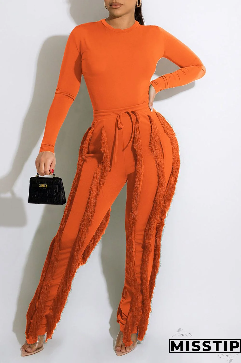 Tangerine Red Casual Solid Tassel Patchwork O Neck Long Sleeve Two Pieces