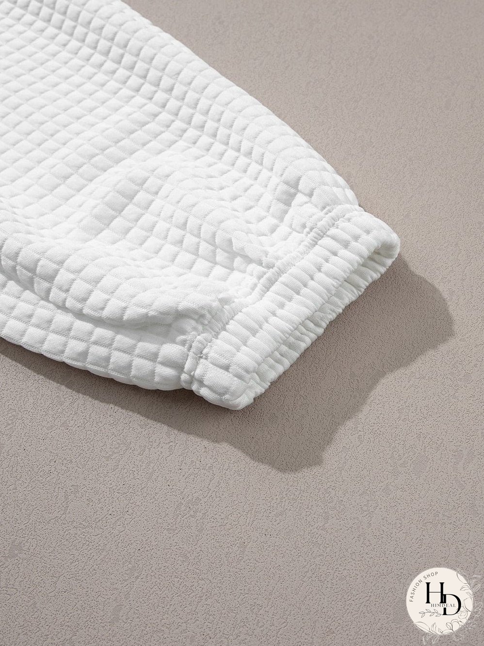 Chic White Textured Lattice Crop Top and Jogger Pants Ensemble