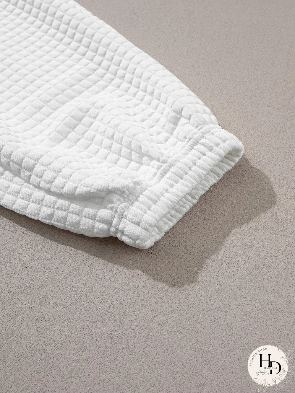 Chic White Textured Lattice Crop Top and Jogger Pants Ensemble