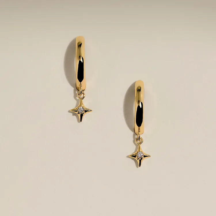 Cosmic Star Charm Huggies in Gold
