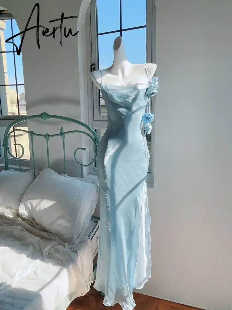 Aiertu Elegant Ice Blue Spaghetti Strap Slim Fitting Women's Dress Rose Decoration Pleated Boat Neck Irregular Eage Birthday Party Gown Aiertu