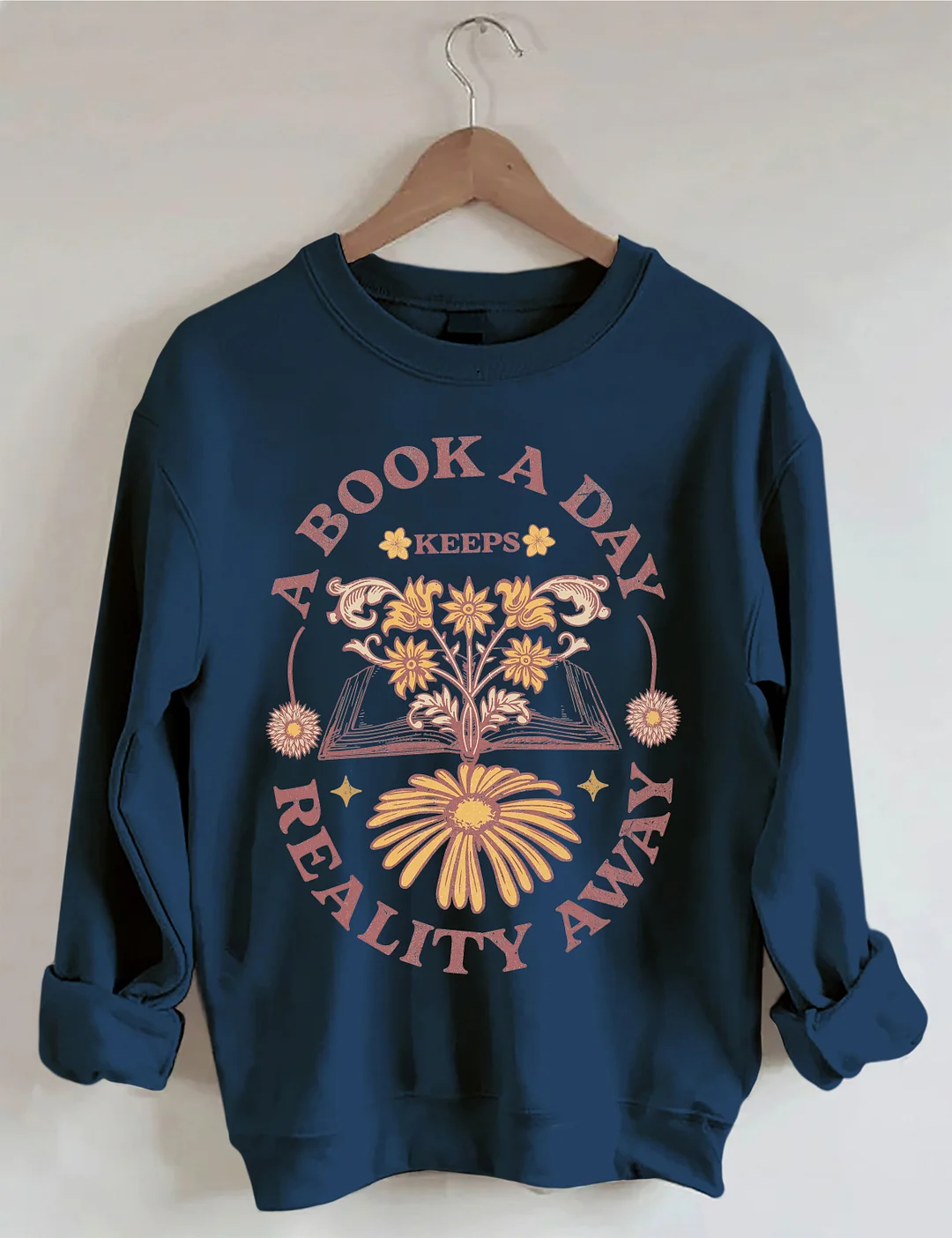 A Book A Day Keeps Reality Away Sweatshirt