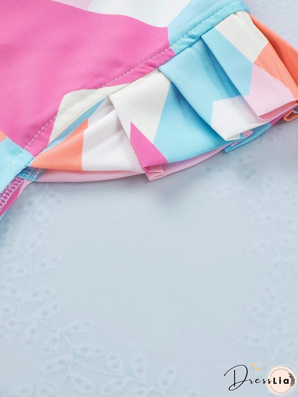 Pastel Geometric Print V-Neck Cap Sleeve Top with Colorblock Detail