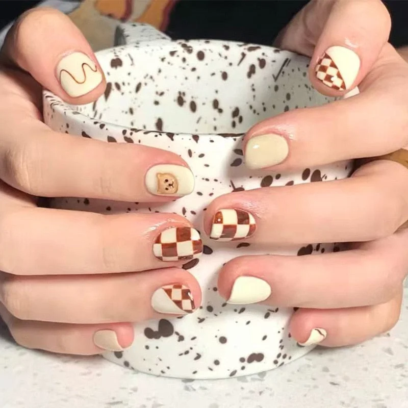 24Pcs Fake Nail Tips For Women Frosted Matte Nails with glue Nude with Black Love Heart Print designs Press On false fingernail-Nail Inspo