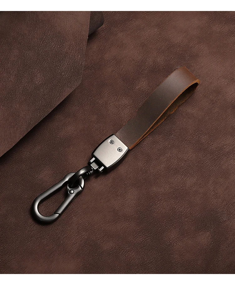 🔥Hot sale🔥Exclusive logo🔥Car anti-lost genuine leather alloy keychain