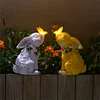 Statue de jardin lapin avec lumi&egrave;re solaire papillon