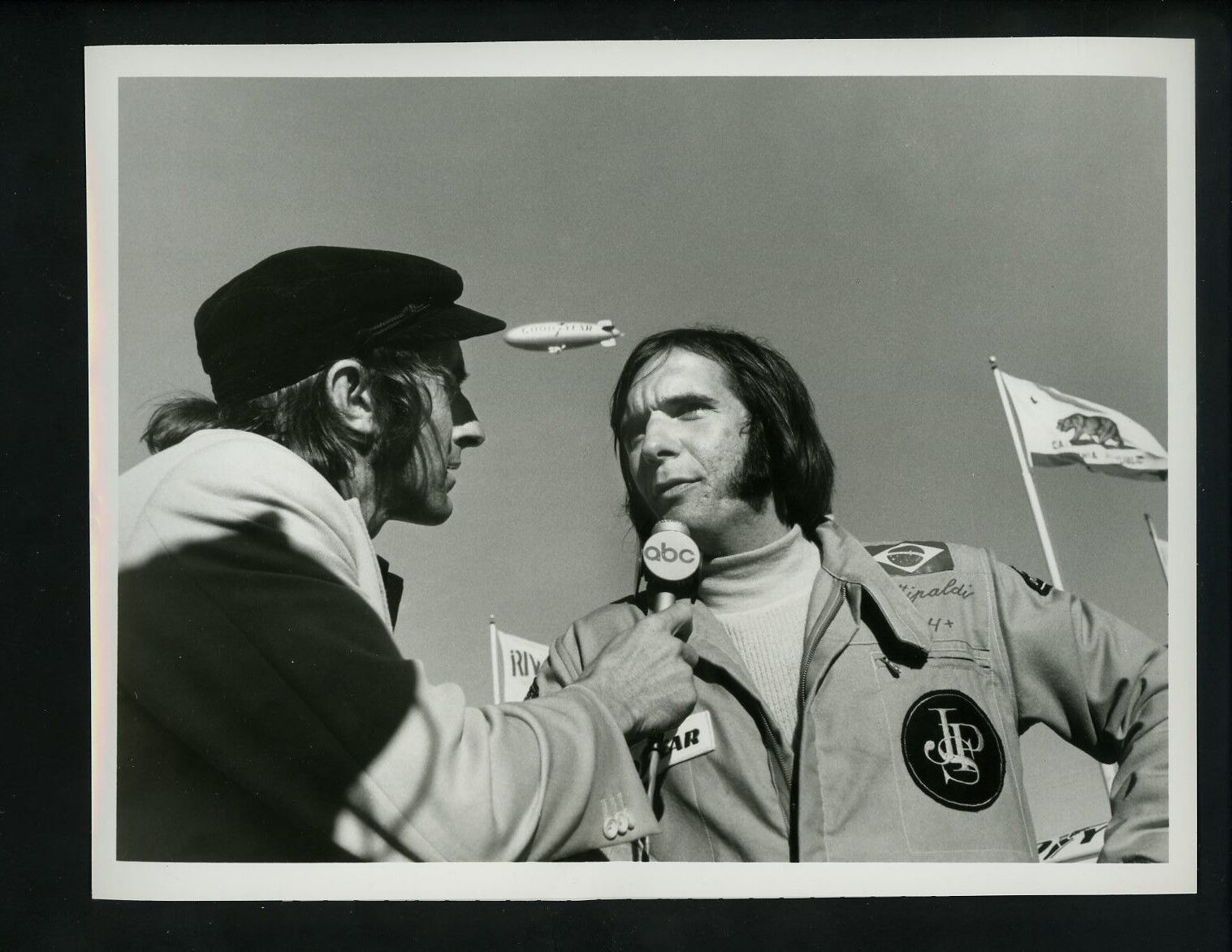 Jackie Stewart & Emerson Fittipaldi 1974 ABC Sports Type 1 Press Photo Poster painting