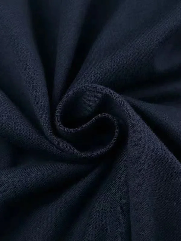 Brownm dark blue long sleeve top with letter logo