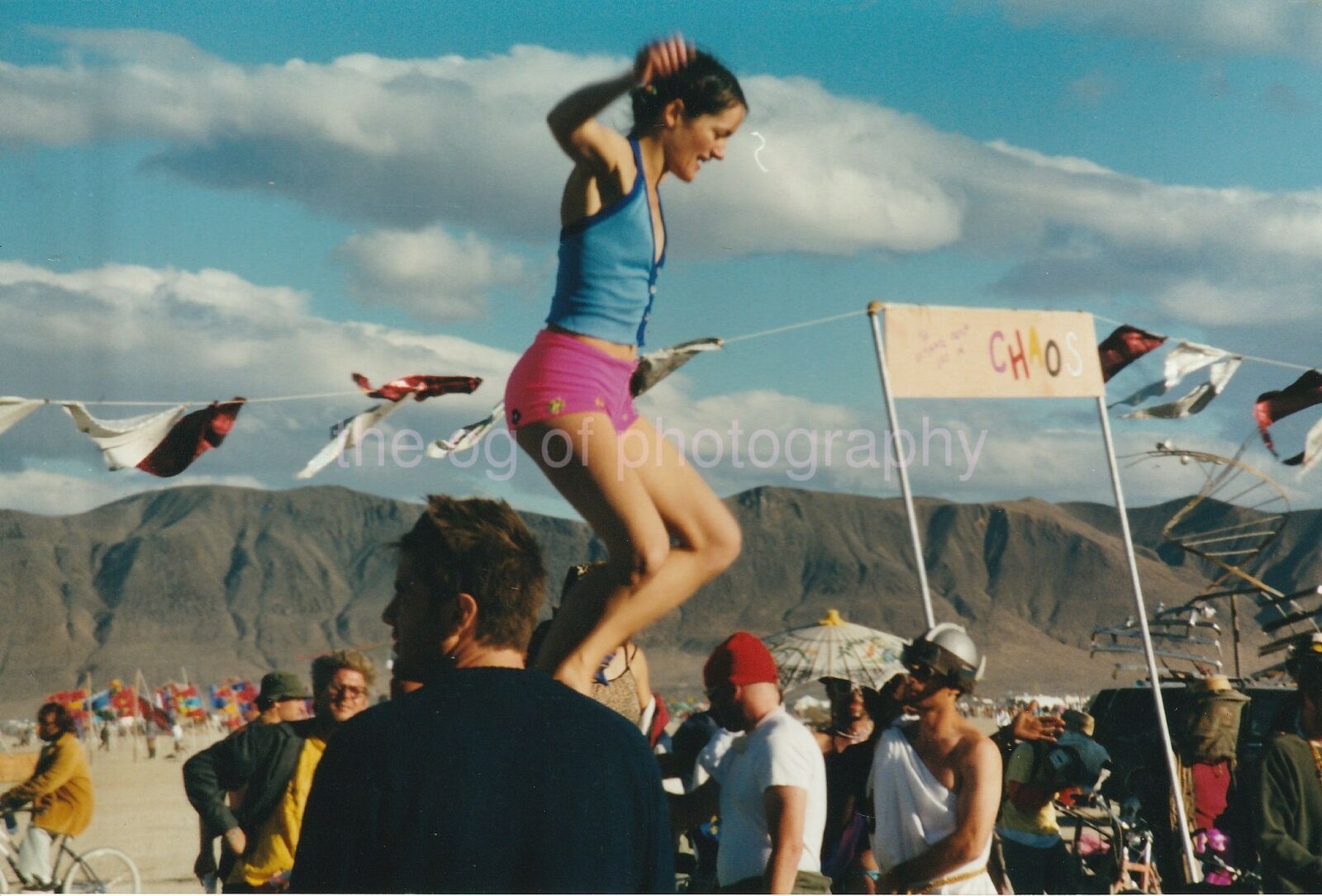 BOUNCING GIRL Burning Man 1990's FOUND Photo Poster painting ColorPretty 96 7 Q