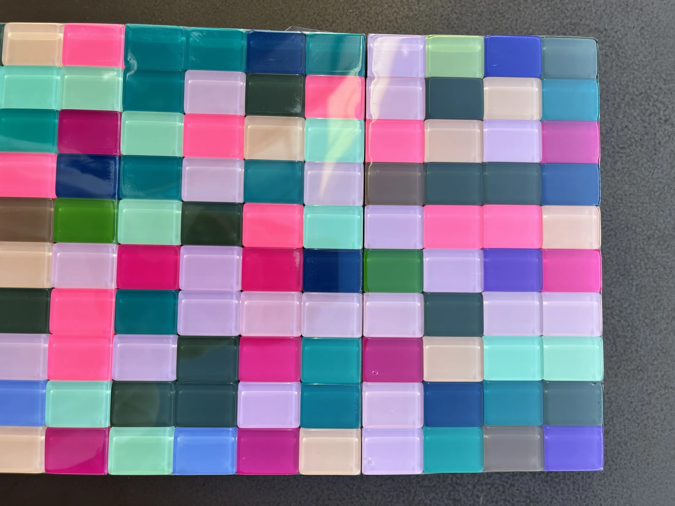 Authentic solid-color backs arranged to show the randomized palette.
