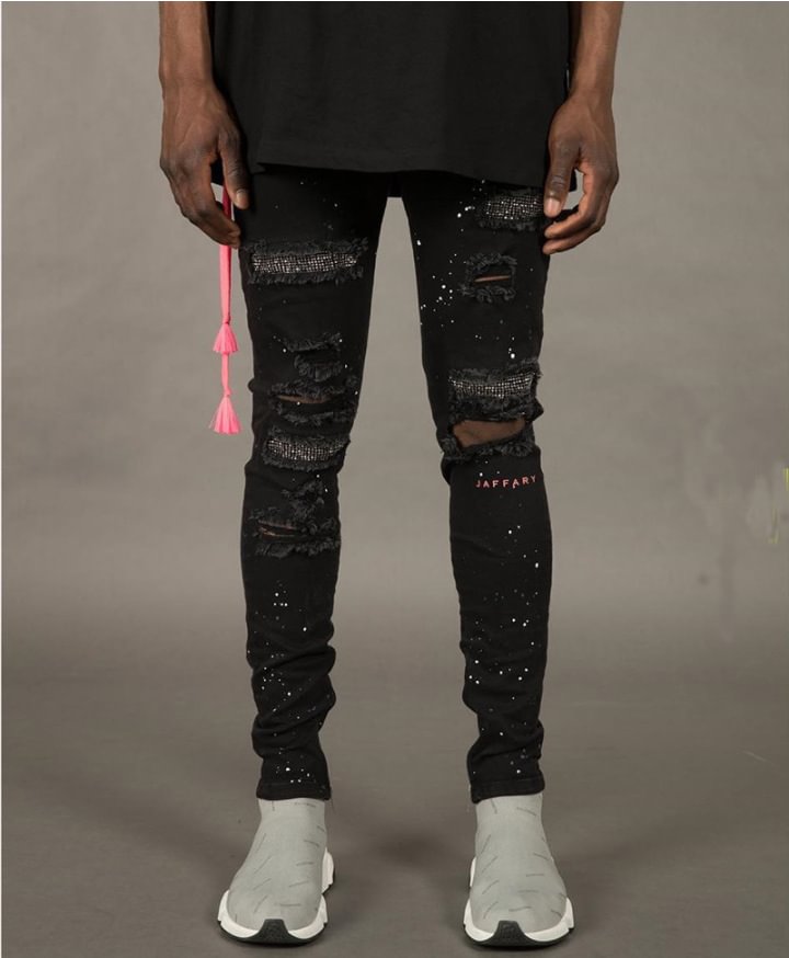 Painted shredded skinny jeans