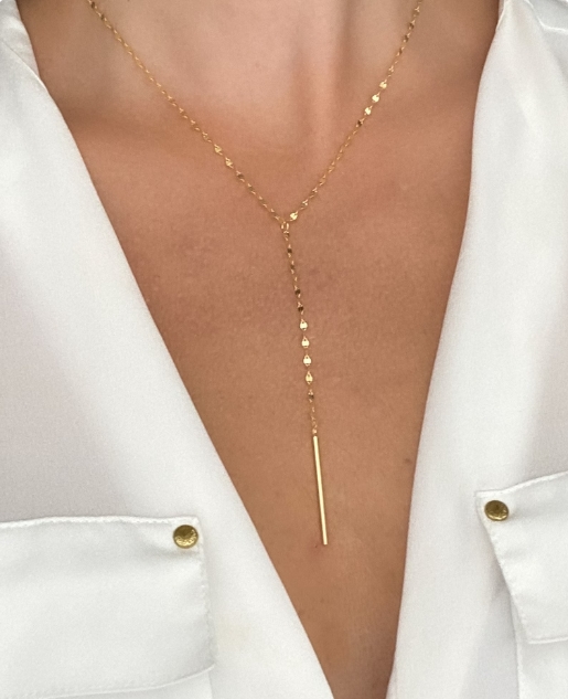 Gold Y-shaped tassel necklace in eco-friendly titanium steel, minimalist style 