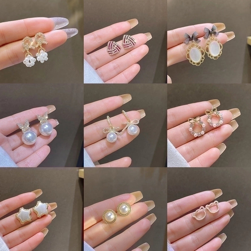 Sweet Star Flower Bow Knot Alloy Inlay Artificial Pearls Rhinestones Women's Earrings 1 Pair