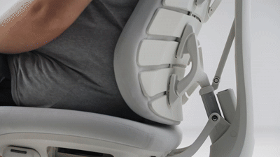 Adaptive back support for changing seated positions