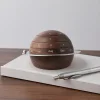 The Planet Calendar is made of solid wood. It can accurately display the date, week and month. It looks like a planet.