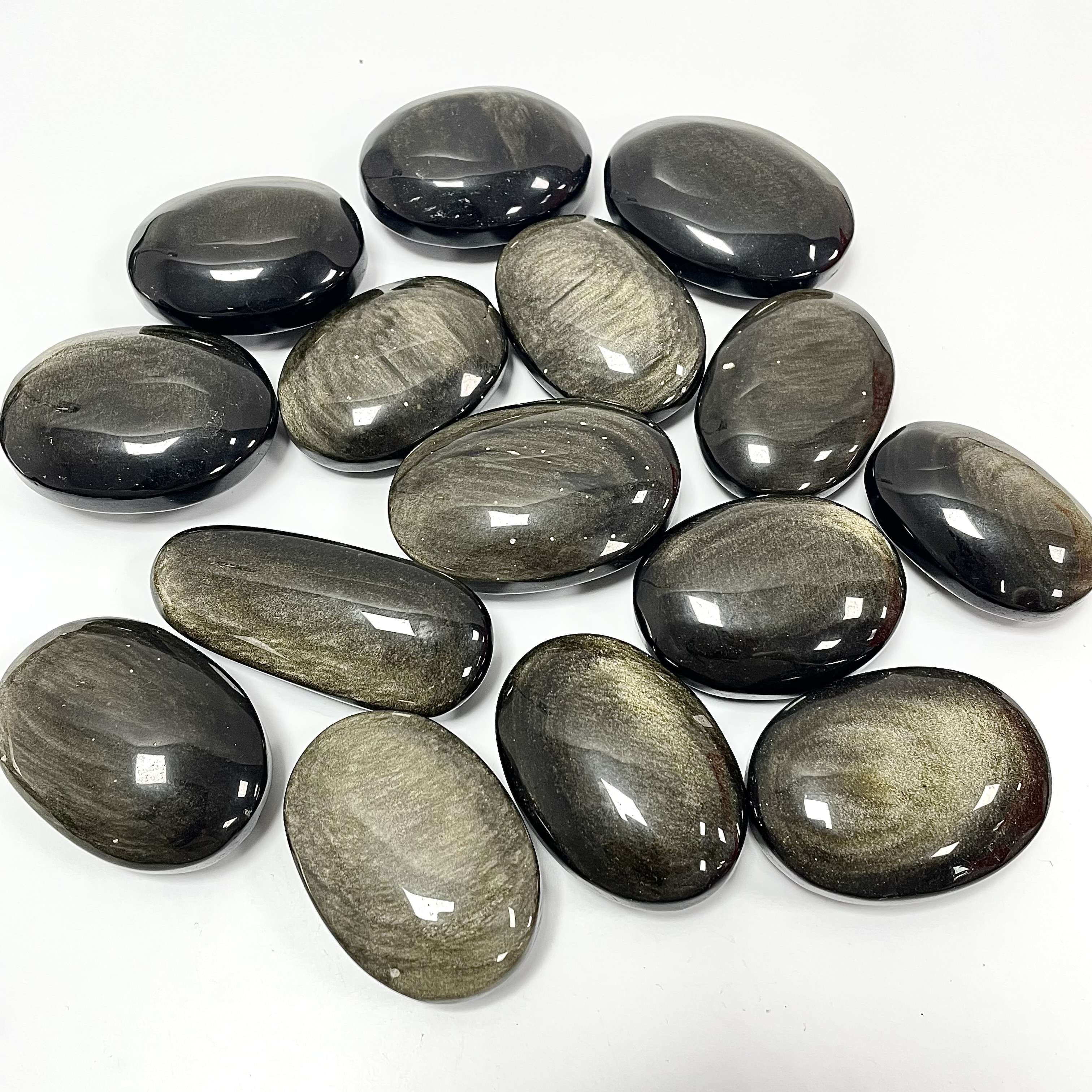 Golden Obsidian Palm Stone